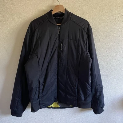 Chaqueta acolchada aislada de bombardero de nailon vintage Y2K Salomon mediana negra Gorpcore Foto 1 de 4
