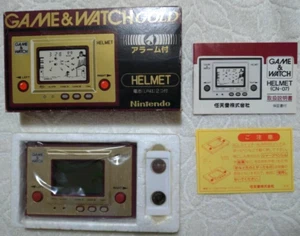 Nintendo Game & Watch Helmet CN-07 Gold Series boxed - Picture 1 of 8