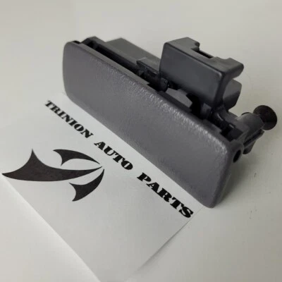 Nissan Xterra 2000-2006 guantera pestillo gris con tornillos OEM Foto 1 de 4