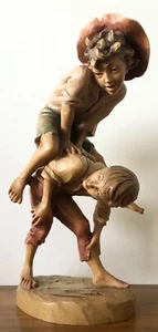 Vintage Hand Carved WOOD Painted Wooden ANRI Two Boys Playing Leap Frog Figurine - Picture 1 of 8