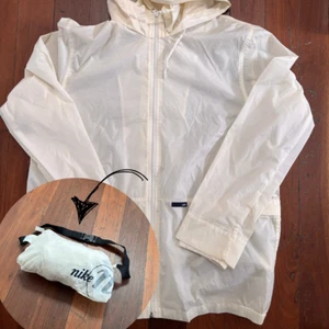 Vintage Y2K Nike Jacket Size M White Bag Nylon Windbreaker Raincoat Full Zip - Picture 1 of 7