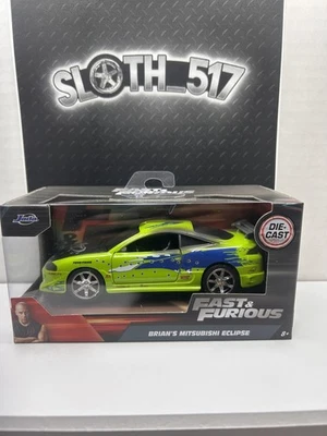 Jada 1:32 Fast & Furious Brian's Mitsubishi Eclipse con agujeros de bala quemadura Foto 1 de 4