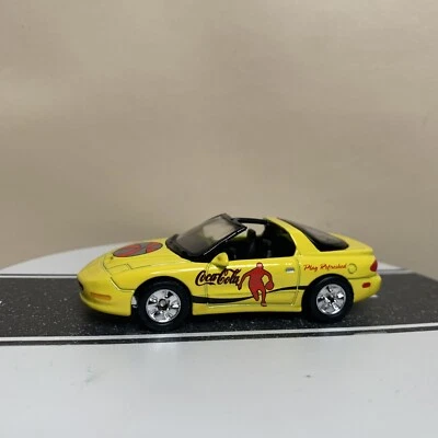 Matchbox Collectibles Coca Cola Pontiac Firebird Ram Air T-Top Coupe Yellow 1:64 - Image 1 of 4