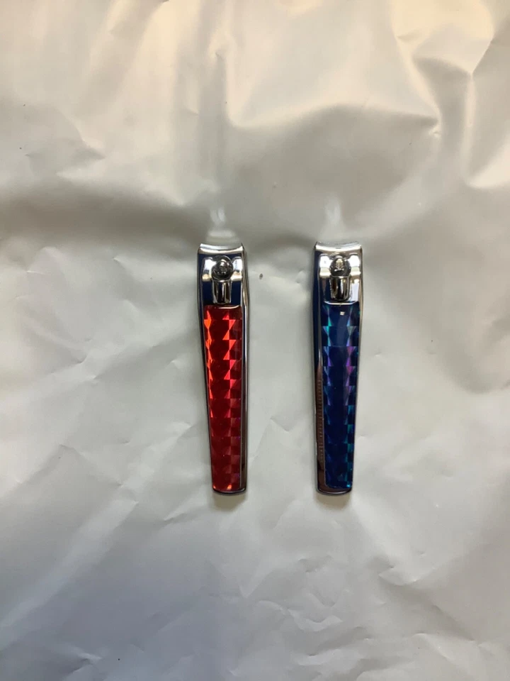 Lote de 2 cortaúñas con joyas rojo y azul 1 de cada uno Foto 1 de 1