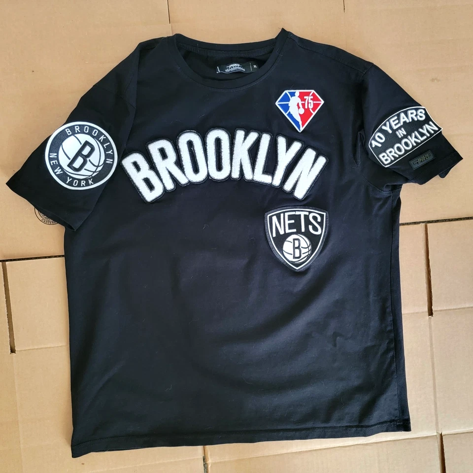 Pro Standard Youth Brooklyn Nets 10 Yr Anniversary Black Embossed Logo TShirt XL - Image 1 of 4
