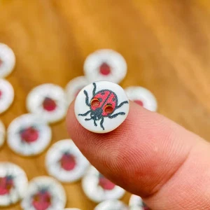 10pcs  Res Ipsa Loquitur Melbourne - 11mm Ladybug Shell - 2 Hole Buttons - Picture 1 of 3