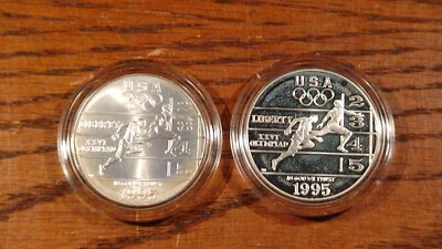 TWO 1996 P & D ATLANTA TRACK & FIELD 1 OZ .999 SILVER COINS IN CAPSULES! - Image 1 of 2