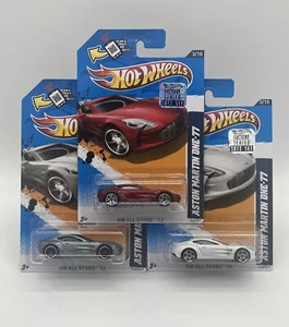 2012 HOT WHEELS HW ALL STARS ASTON MARTIN ONE-77 WITH FACTORY STICKER LOT OF 3 - Picture 1 of 15