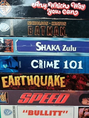 7 VHS - Any Which Way You Can/Batman/"Bullitt"/Crime 101/Earthquake/Speed/Shaka - Image 1 of 4