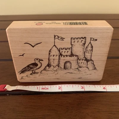 Sello de goma INKADINKADO Galerie Vernissage castillo de arena gaviota playa océano madera Foto 1 de 4