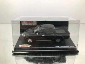 VITESSE 29335 MITSUBISHI L200 DI-D WARRIOR LIM.ED -BLACK 1:43- GOOD IN SHOWCASE - Picture 1 of 8