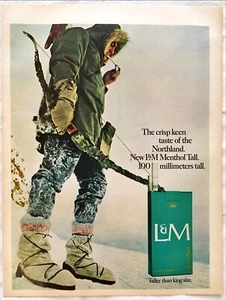 Anuncio impreso vintage 1967 L&M cazador de cigarrillos mentolados con arco y flecha en la nieve - Imagen 1 de 1