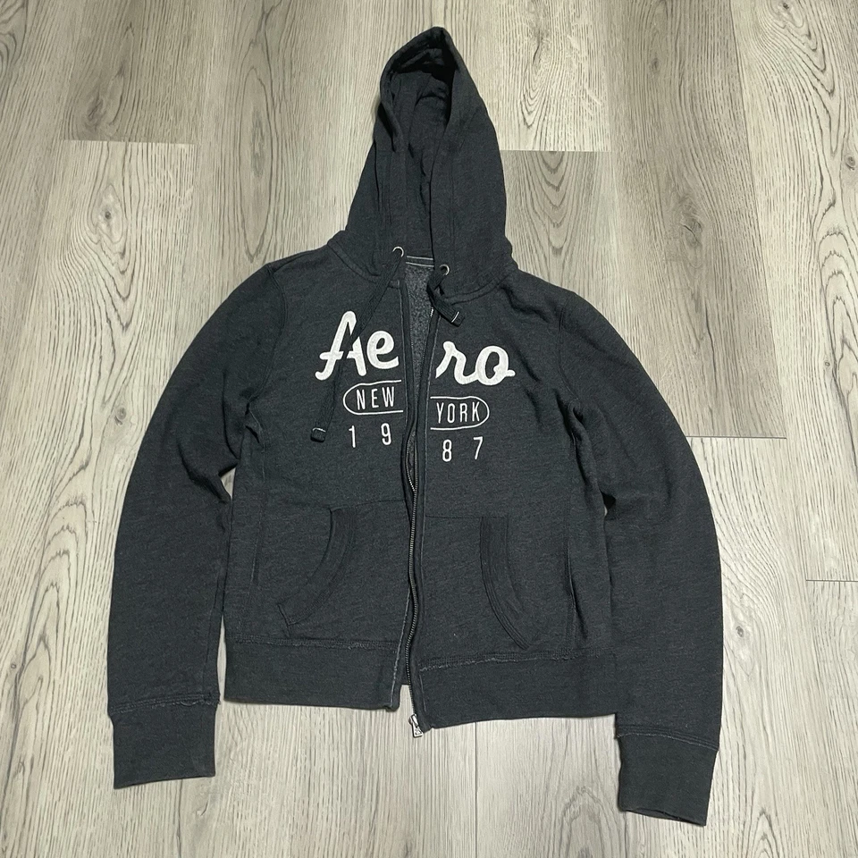 Sudadera con Capucha Y2K Aeropostale Para Mujer Gris Medio Sudadera con Cremallera (Crebilla Rota) Foto 1 de 4