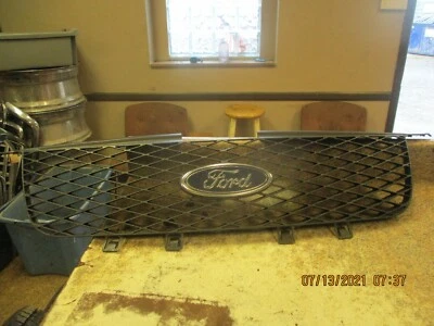 05-06 2005-2006 Ford 500 quinientos parrilla negra pintada de fábrica con emblema OEM Foto 1 de 4