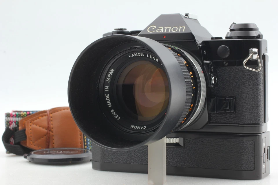 (HOOD [fast neuwertig] Canon AE-1 Program Filmkamera schwarz FD 50mm F1.4 Objektiv JAPAN - Bild 1 von 4