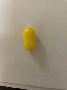 Peanut shaped Lemonhead candy. Rare. Yellow, about an inch long. - Picture 1 of 2