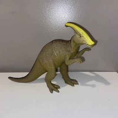 Dinosaurio Parasaurolophus prehistórico de goma suave verde amarillo Foto 1 de 4