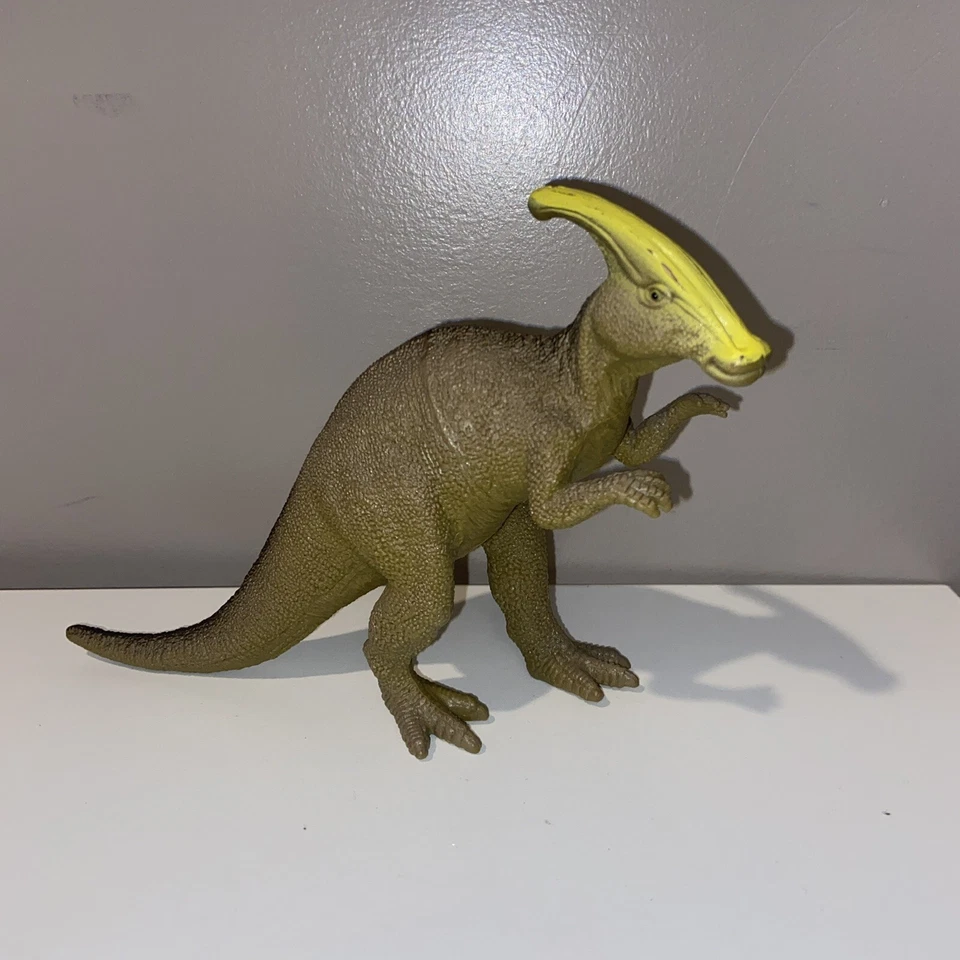 Dinosaurio Parasaurolophus prehistórico de goma suave verde amarillo Foto 1 de 4