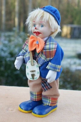 Clown automate musical articulé en porcelaine H 32 Cm. - Photo 1/4