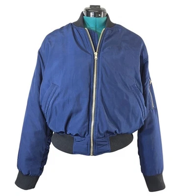 Chaqueta de bombardero UNIF x Urban Outfitters para mujer talla L azul dorado con cremallera Foto 1 de 4
