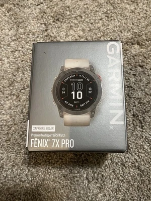 Garmin Fenix 7X Pro Zafiro Solar - Titanio con Banda Gris Naranja Foto 1 de 4