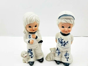 Two Vintage Ceramic Bisque Boy And Girl Figurine Blue Flower Design UCGC - Picture 1 of 9
