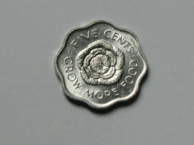 Moneda de aluminio FAO de 5 centavos de Seychelles 1975 AU+ con brillo tonificado y forma especial Foto 1 de 2