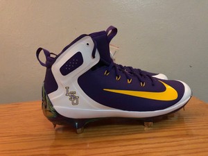 purple and white baseball cleats