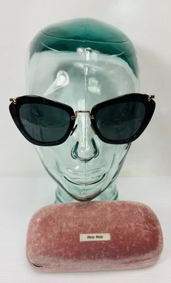 Gafas de sol Miu Miu negras degradadas doradas SMU 10 N Foto 1 de 4