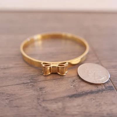 Brazalete Brazalete Kate Spade NY Take A Bow Tono Dorado!!! Foto 1 de 3