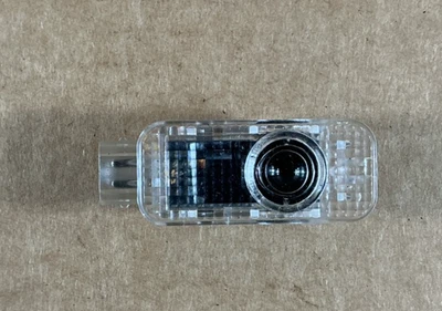 2012-2014 Audi A7 Quattro Front Right Side Door Puddle Courtesy Light Lamp OEM - Image 1 of 4
