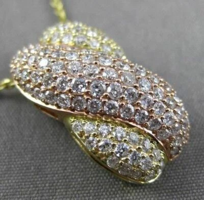 COLGANTE FILIGRANA INFINITA ORO AMARILLO Y ROSA 14K DIAMANTE GRANDE DE 1,0 QUILATES Foto 1 de 4