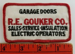 Vintage R.E. Parche de servicio de aislamiento de puertas de garaje Gouker Uniontown Pennsylvania - Imagen 1 de 2
