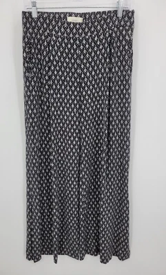 Pantalones Elevenses para mujer pequeños negros blancos estampado azteca abertura pierna acampanada boho fluidos Foto 1 de 4