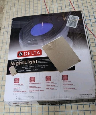 Asiento de inodoro Delta 823902-N-WH Sanborne entrenamiento para ir al baño luz nocturna blanco caja abierta  Foto 1 de 4