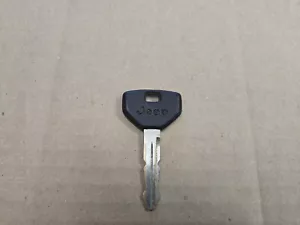 Jeep OEM Factory Black & Chrome Ignition Door Key - Picture 1 of 2