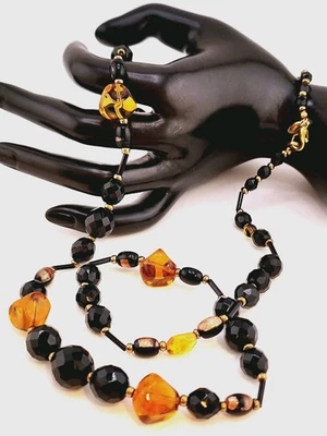 M&S (MARKS & SPENCER) FACETED JET BLACK & ASYMMETRICAL AMBER GLASS NECKLACE-30"L - Image 1 of 4