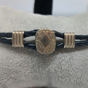 Braided Leather Bracelet W/ Floral Pattern Embossed Silver Center Piece - Picture 1 of 5
