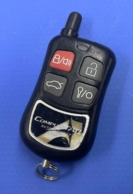USED COMPUSTAR 4-BUTTON REMOTE ALARM FOB TRANSMITTER O44JR1600 1WAMR-1600 - Image 1 of 2
