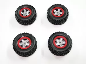 NEU TRAXXAS 1/16 SLASH Räder & Reifen ROTE Ringe RD14R - Bild 1 von 2