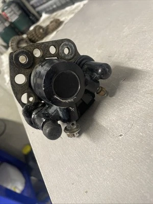 1987 Suzuki RM80 RM 80 OEM REAR BRAKE CALIPER BRACKET CORE FOR REBUILD - Image 1 of 4