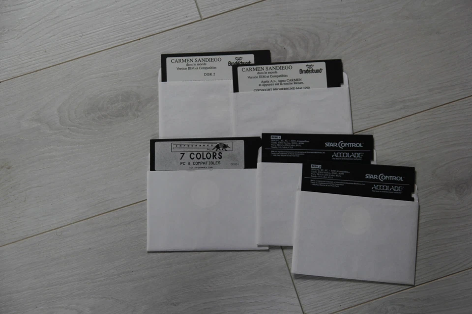 Lot de 3 jeux PC en disquette 5p 1/4 STAR CONTROL - CARMEN SANDIEGO - 7 COLORS - Photo 1/1