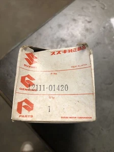 1983 - 1987 SUZUKI LT125 OEM  NEW PISTON IN BOX  12111-01420 - Picture 1 of 8