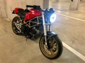 FARO LED MOTO 7" PER DUCATI MONSTER 600 620 695 6000K 75W HORNET BMW RACER - Imagen 1 de 9