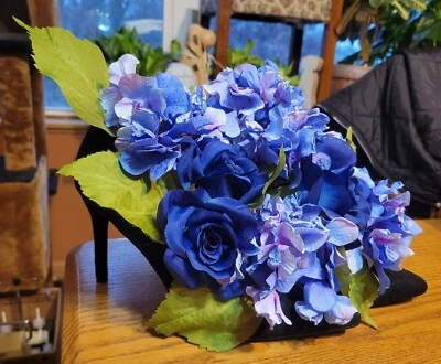 Floral Shoe Arrangement. Blue Roses and Hydrangeas in Black Velvet Heels. - Image 1 of 2