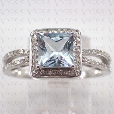 Anillo con halo de diamantes aguamarina natural en forma de princesa de 4,10 quilates enchapado en oro blanco de 18 quilates Foto 1 de 4