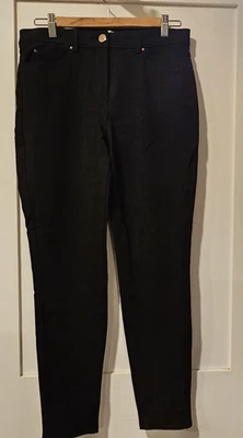 Pantalones H&M para mujer EE. UU. 8 negros ajustados elásticos bolsillos de tiro alto calce ajustado modernos Foto 1 de 4