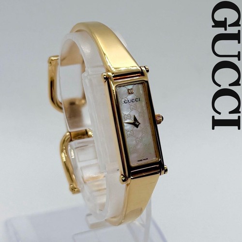 Orologio da donna Gucci GG Supreme 1P con bracciale in oro e diamanti