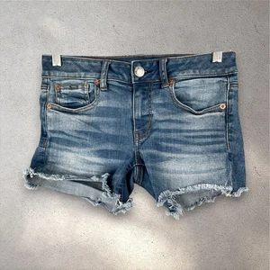 American Eagle Super Stretch Jean Shorts Womens 4 Blue Distressed Frayed Hem Y2K - Picture 1 of 8