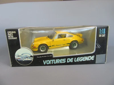 D575 Universal Hobbies 320300 Porsche 911 Carrera Rs 2.7 L 1973 Gialla 1/18 Box - Immagine 1 di 4